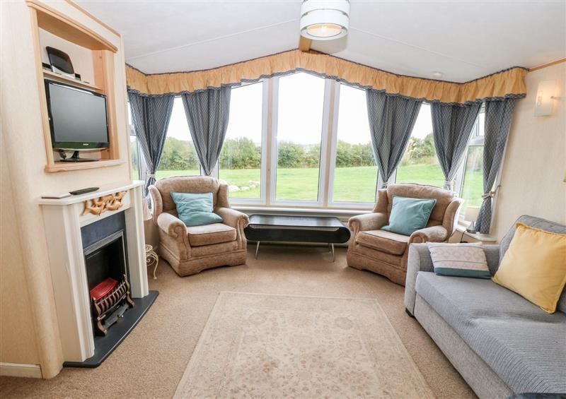 The living area at Plastirion Caravan, Llanfairynghornwy