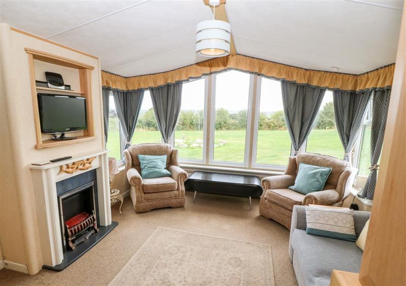 The living room at Plastirion Caravan, Llanfairynghornwy