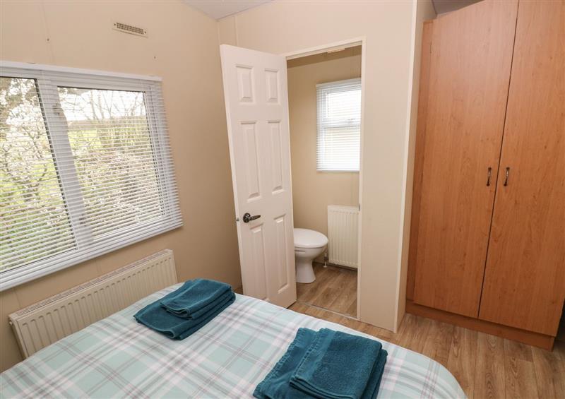 One of the 2 bedrooms at Plembury Cottage Caravan, Llanboidy near Whitland