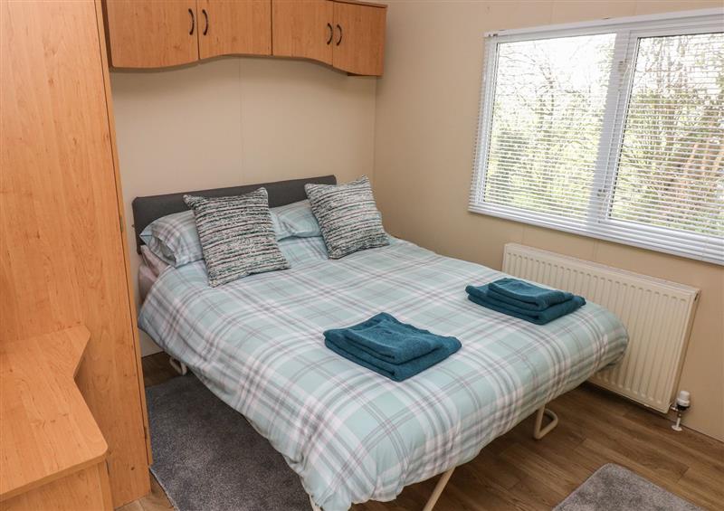 This is a bedroom at Plembury Cottage Caravan, Llanboidy near Whitland