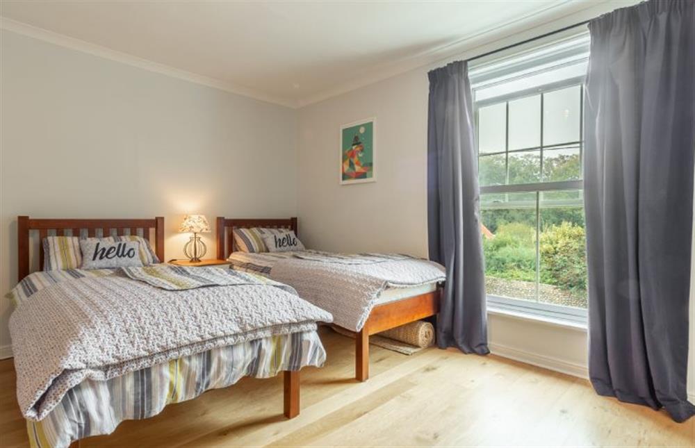 First floor: Bedroom two with 3ft twin beds at Plum Cottage, Overstrand near Cromer