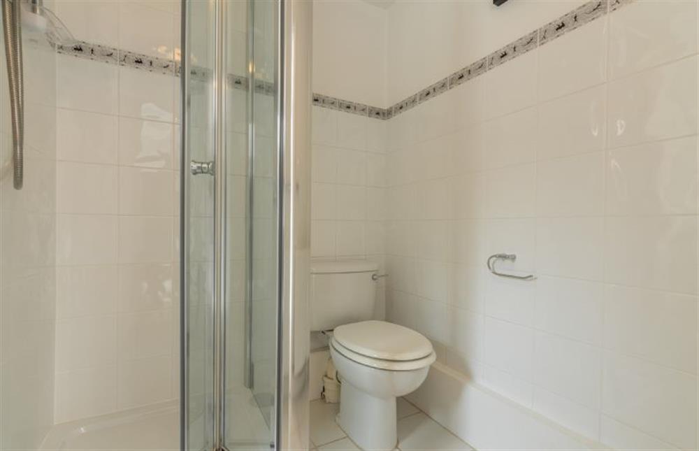 Ground floor: Shower room with WC and wash basin at Plum Cottage, Overstrand near Cromer