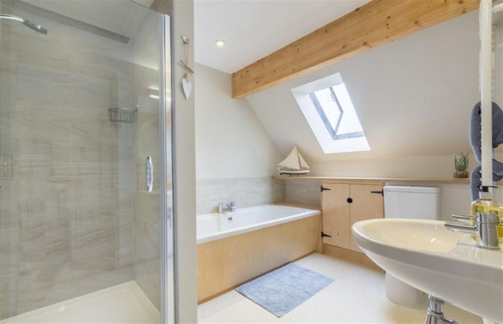 First floor: Family bathroom with bath and separate shower at Plumtrees, Thornham near Hunstanton