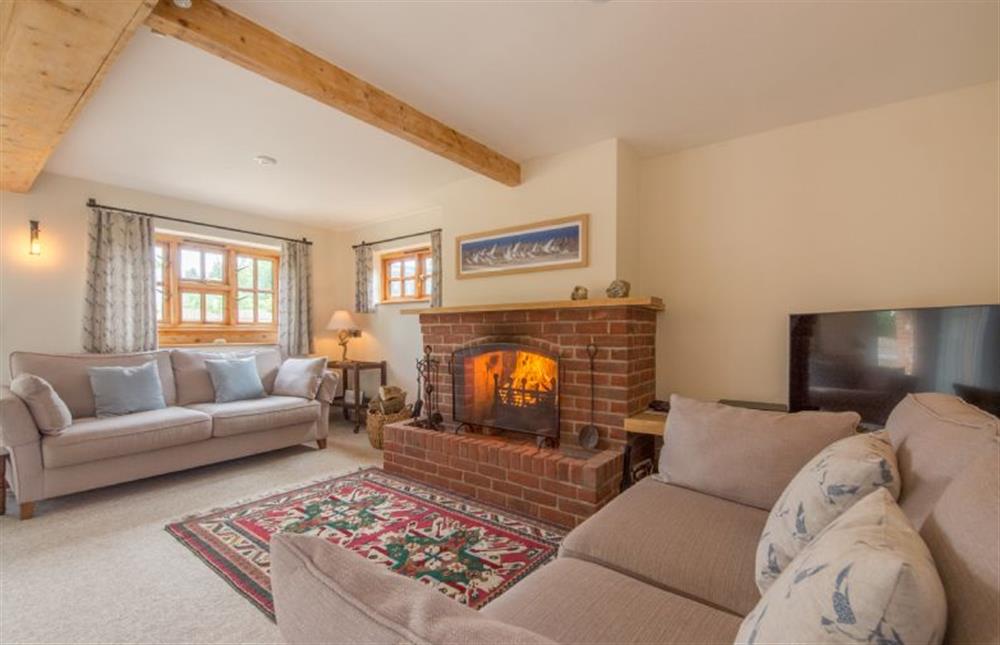 Ground floor: Sitting room with large open fire