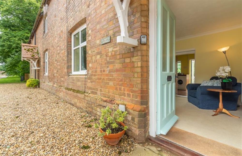 Ground floor: Entrance into cosy Sitting room at Plunketts Cottage, Brancaster near Kings Lynn