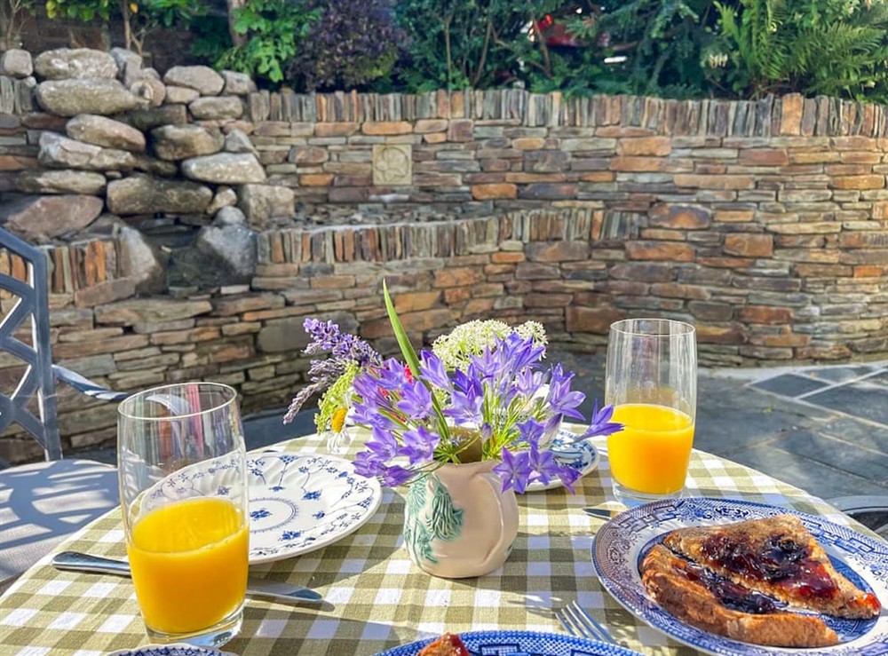 Outdoor eating area at Point House in St Just in Roseland, Cornwall