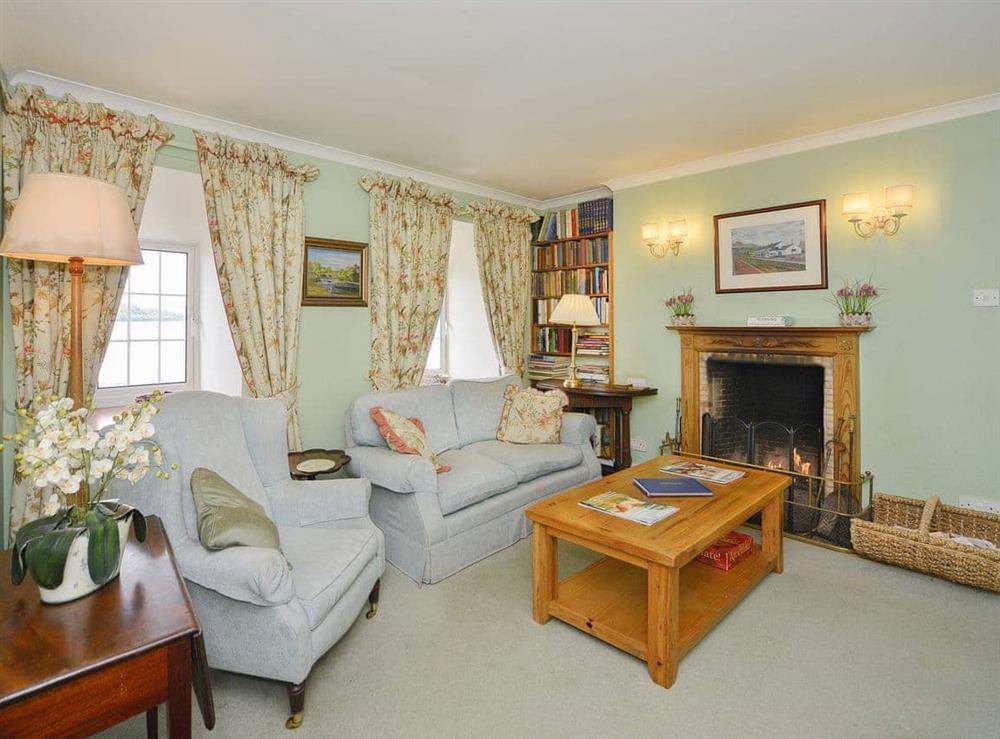 Comfortable living room with a cosy open fire at Point Park in Taynuilt, Argyll., Great Britain