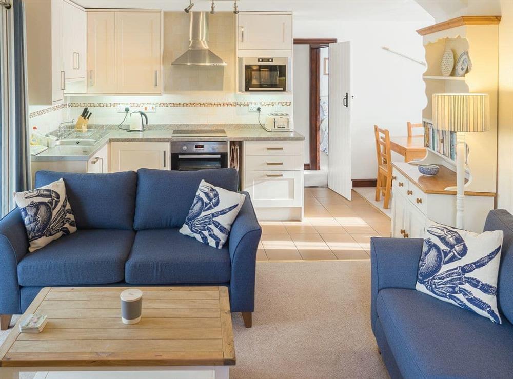 Well presented open plan living space at Poirot Cottage in Lyme Regis, Dorset., Great Britain