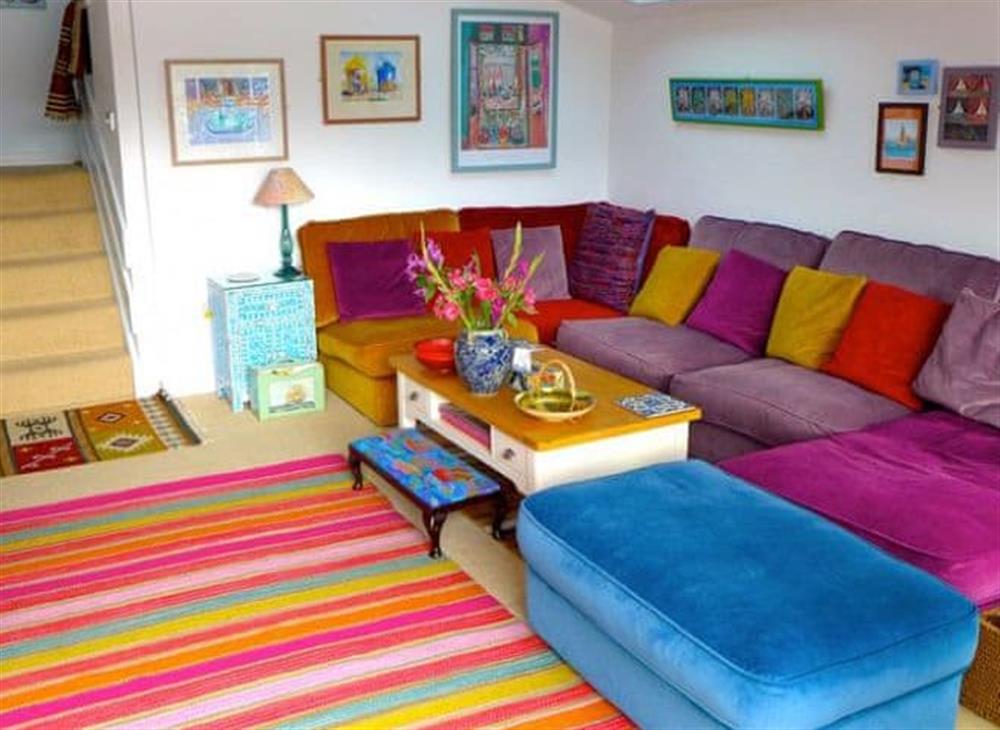 Colourful sitting room at Polbathic in Fowey, Cornwall