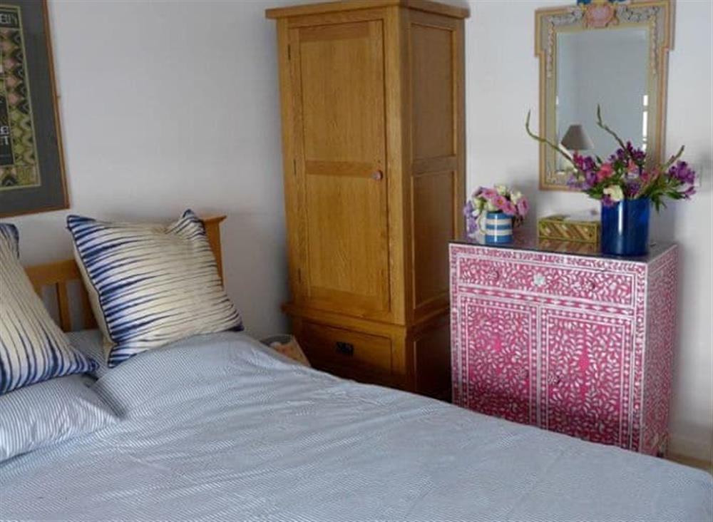 Pretty double bedroom at Polbathic in Fowey, Cornwall