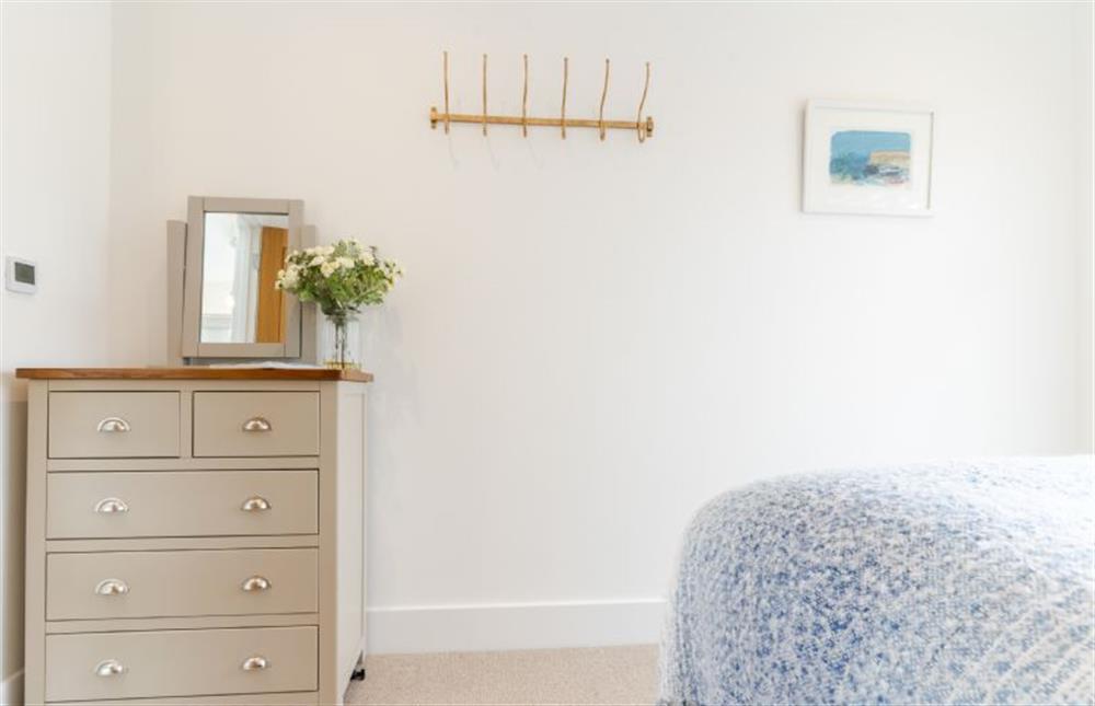 Bedroom two offers an abundance of natural light at Polberro Cottage, St Agnes