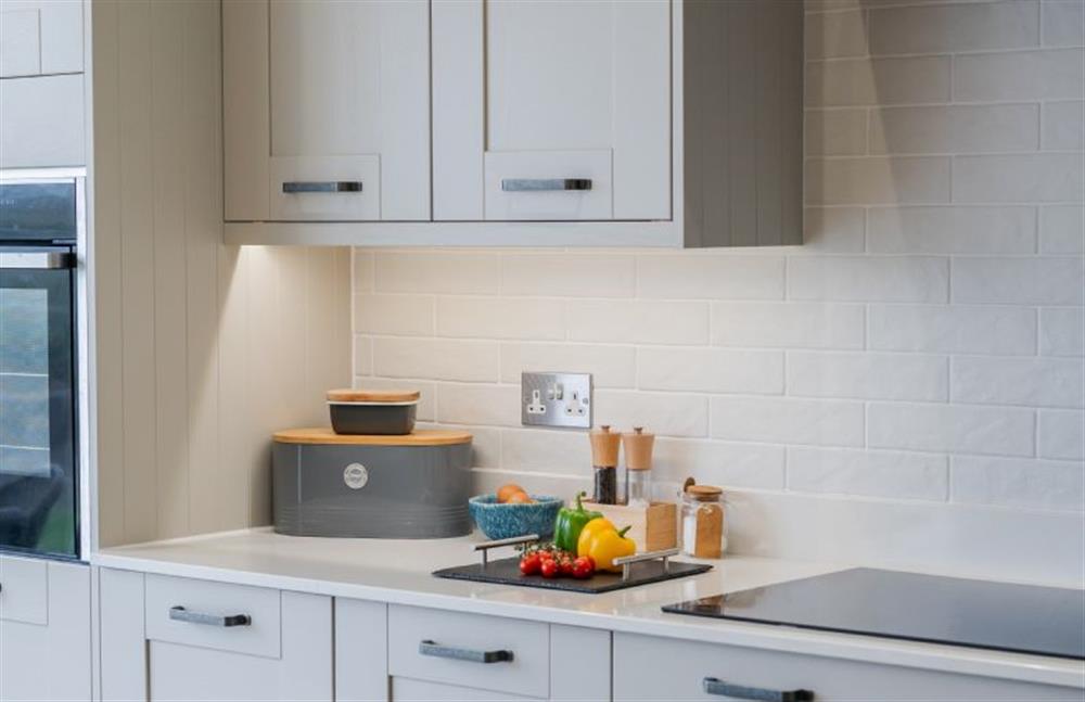 Enjoy the sleek and contemporary kitchen space at Polberro Cottage, St Agnes