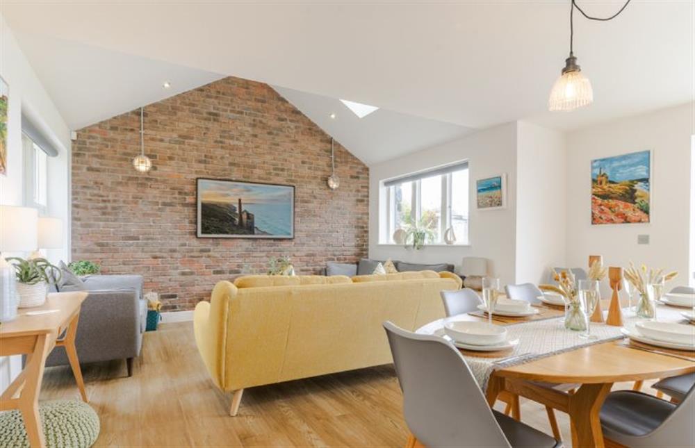 With vaulted ceilings and an exposed brick wall at Polberro Cottage, St Agnes