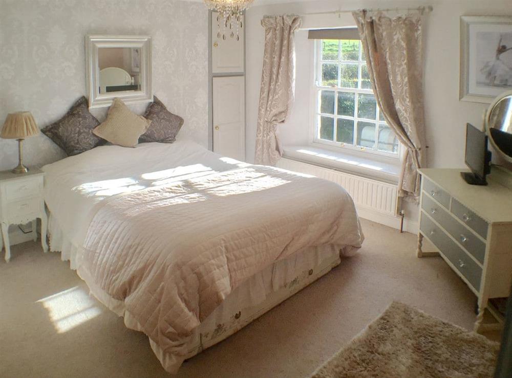 King sized bedroom at The Old Farmhouse, 