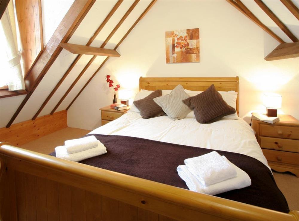 Double bedroom at Threpney Cottage, 