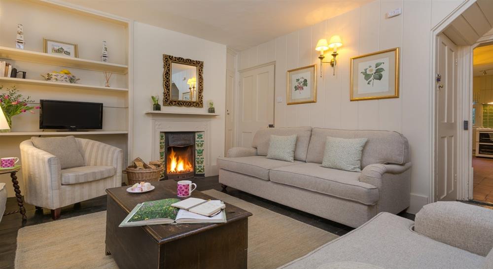 The sitting room at Polesden Garden Cottage in Bookham, Surrey
