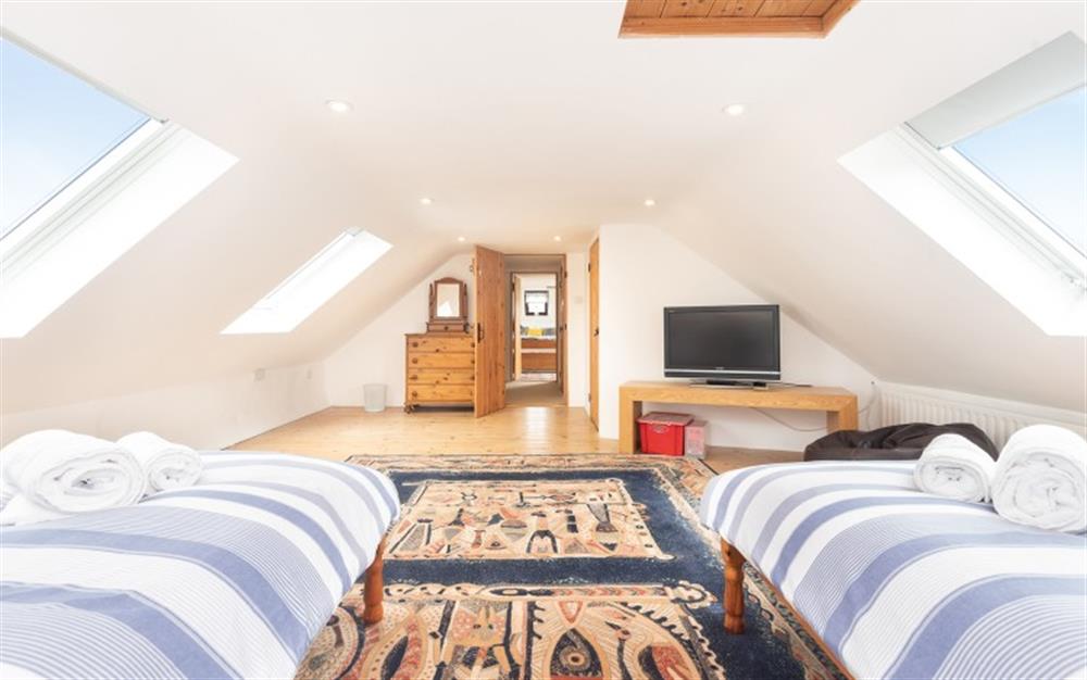 The second floor large twin bedroom at Polgassic Mill in Polperro