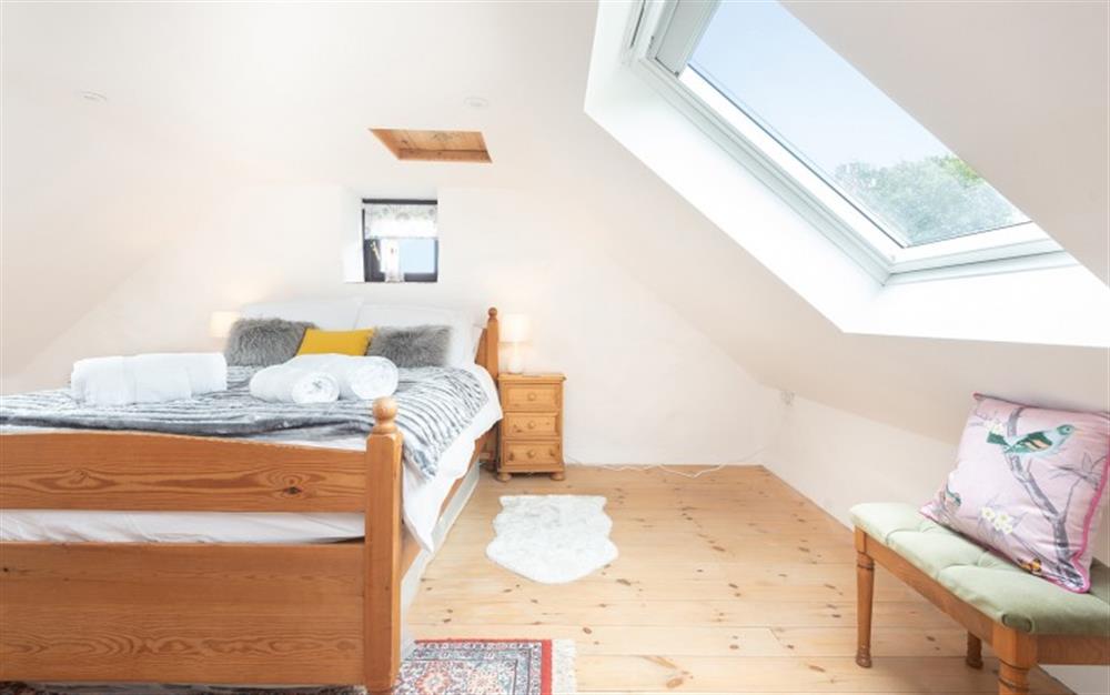 The top floor double bedroom with 6ft ceiling height  at Polgassic Mill in Polperro