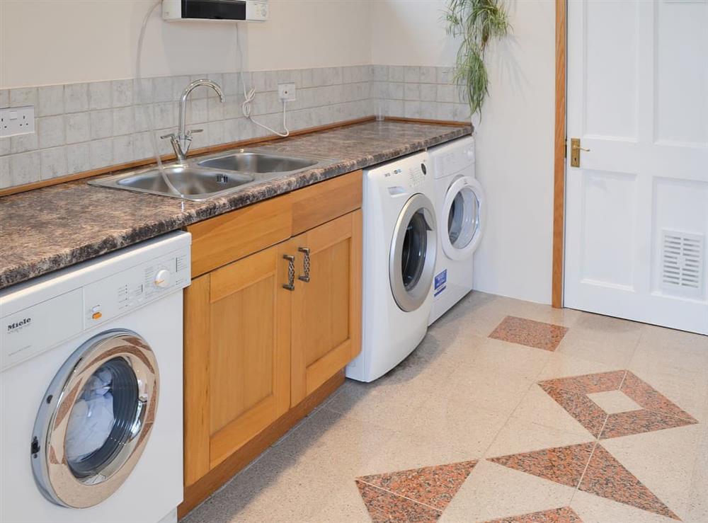 Shared utility room with laundry facilities