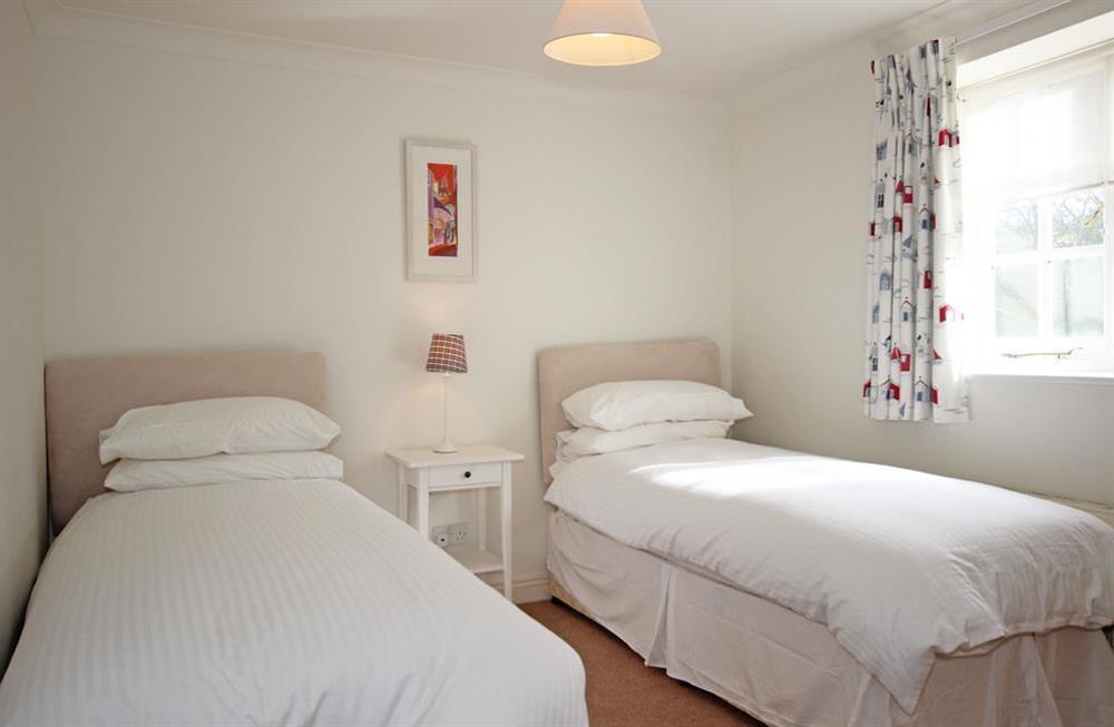 Double bedroom with King-size bed (or twin with small singles as shown) at Poll Cottage in , Salcombe