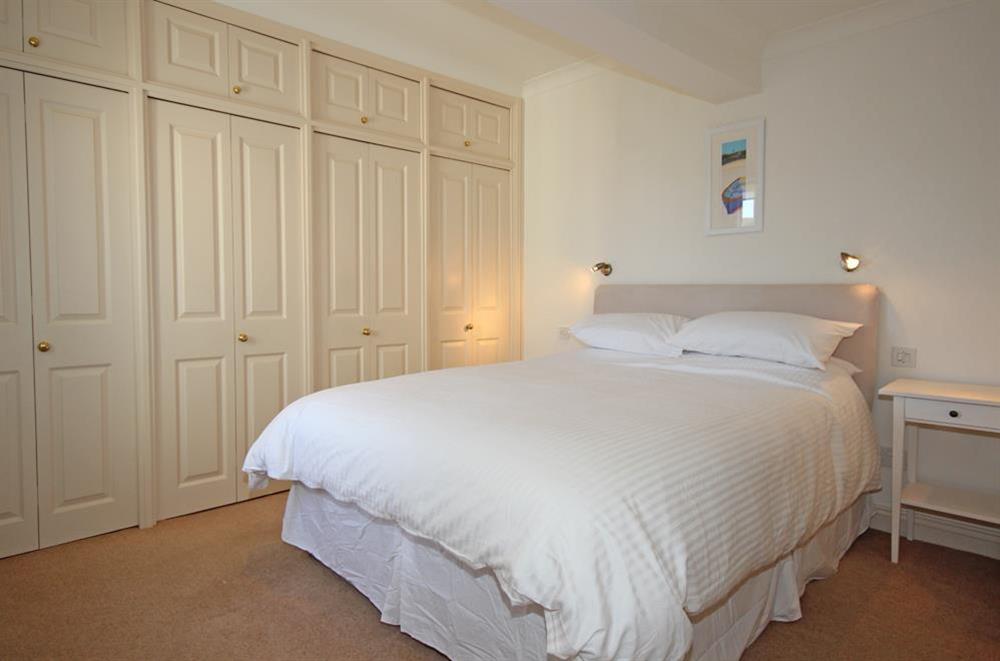En suite double bedroom with King-size bed at Poll Cottage in , Salcombe