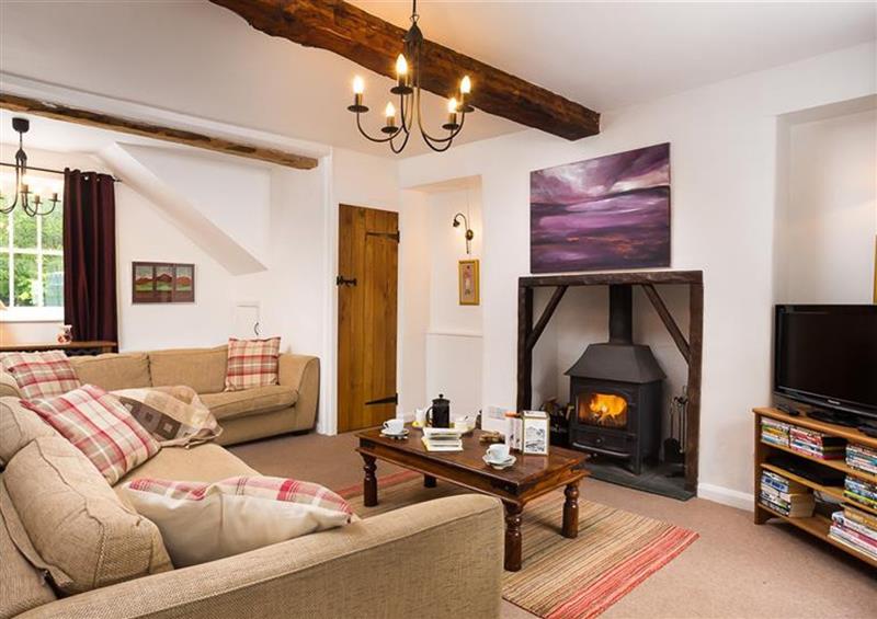 Relax in the living area at Pollys Cottage, Langdale