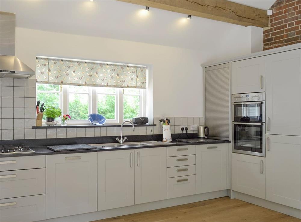 Contemporary fitted kitchen at Pond Cottage in Boldre, near Lymington, Hampshire