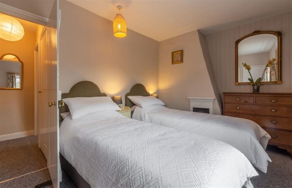 First floor: Bedroom two with twin 2ft6 single beds at Pond Cottage, Edgefield near Melton Constable