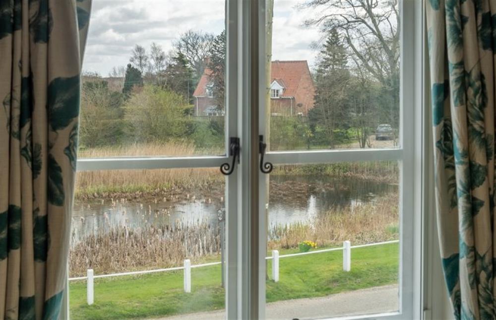 First floor: Lovely village views at Pond Cottage, Edgefield near Melton Constable