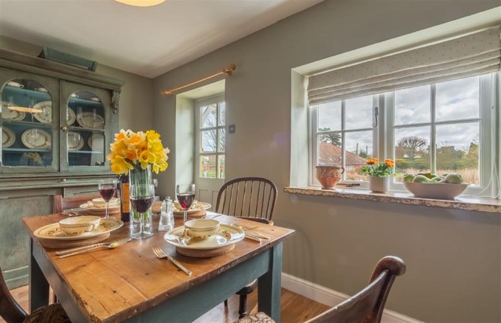 Ground floor: Sunny kitchen/dining room with lovely views at Pond Cottage, Edgefield near Melton Constable