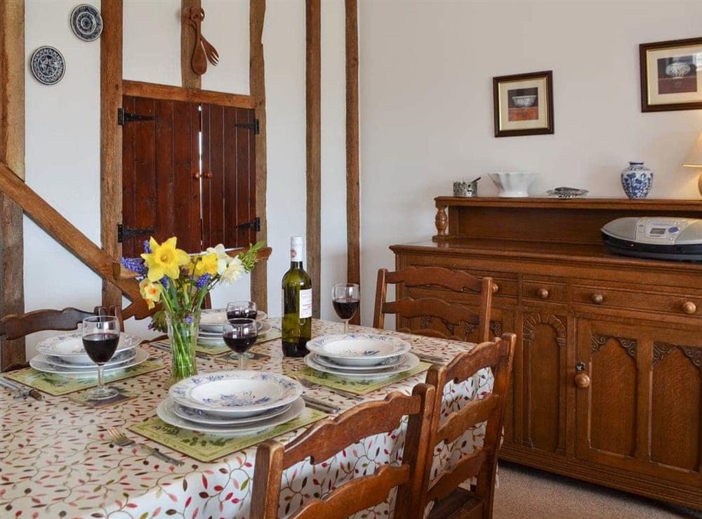 Dining area at Pond Cottage in Peasmarsh, near Rye, East Sussex