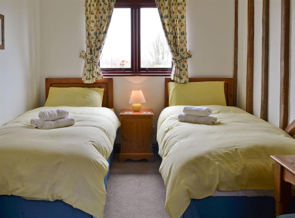 Twin bedroom at Pond Cottage in Peasmarsh, near Rye, East Sussex