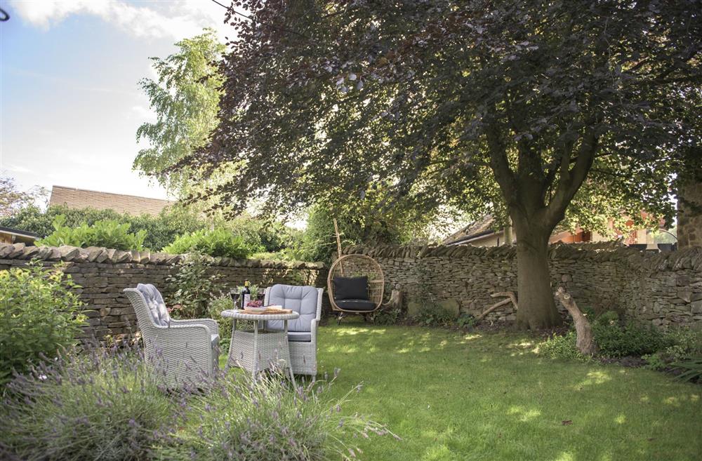 Enjoy the afternoon relaxing in the pretty cottage garden at Pond Cottage, West Witton, Leyburn, North Yorkshire
