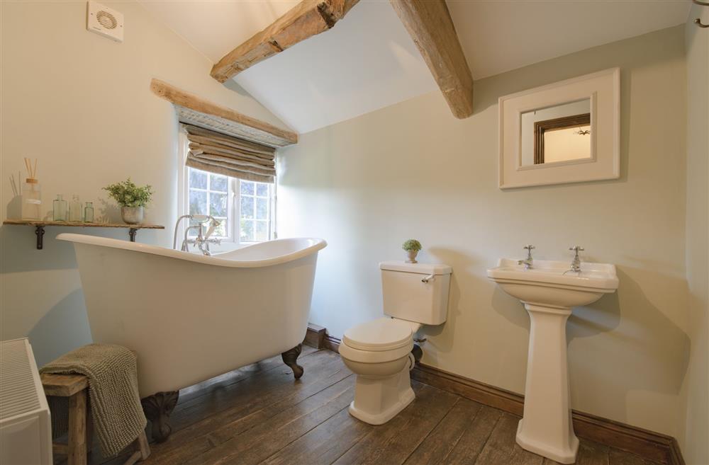 Oozing with character, the bathroom features this stunning free-standing bath at Pond Cottage, West Witton, Leyburn, North Yorkshire