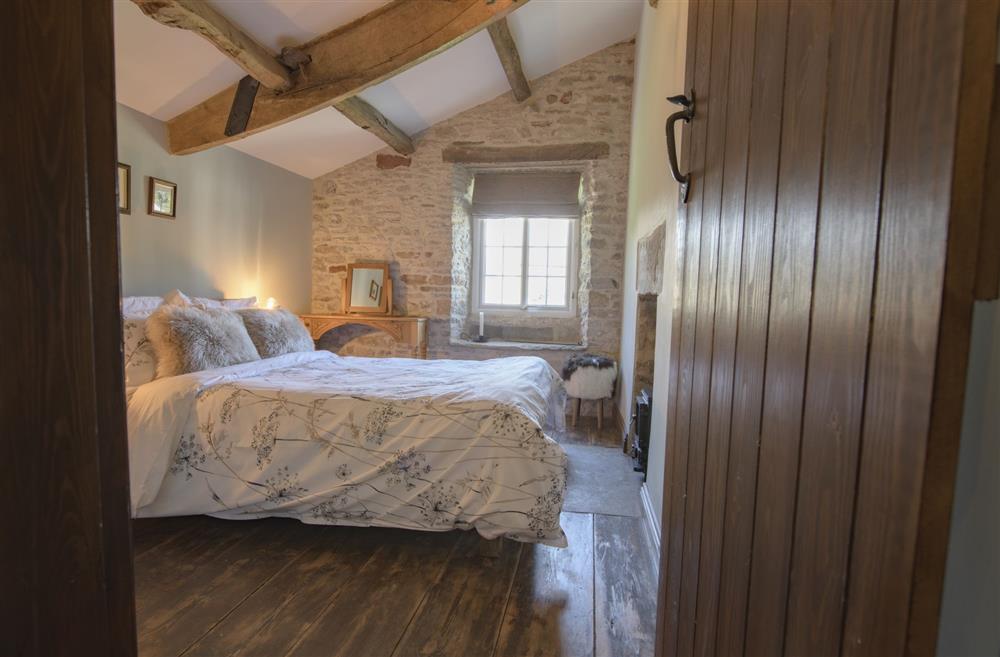 Retire for the evening to the master bedroom nestled in the eves of this gorgeous cottage at Pond Cottage, West Witton, Leyburn, North Yorkshire