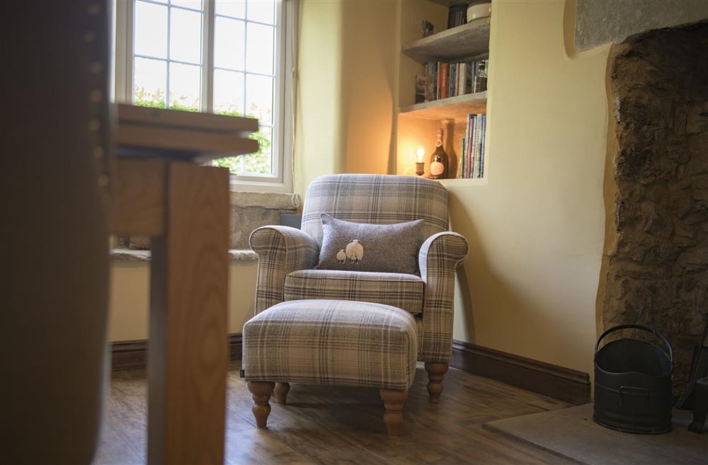 The perfect spot to relax in front of the fire at Pond Cottage, West Witton, Leyburn, North Yorkshire