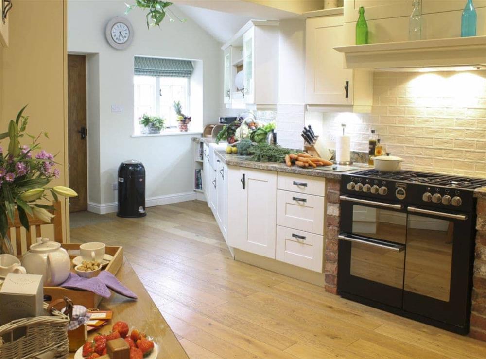 Generously sized kitchen and dining area at Pond View Cottage in Brantingham, near Brough, North Humberside