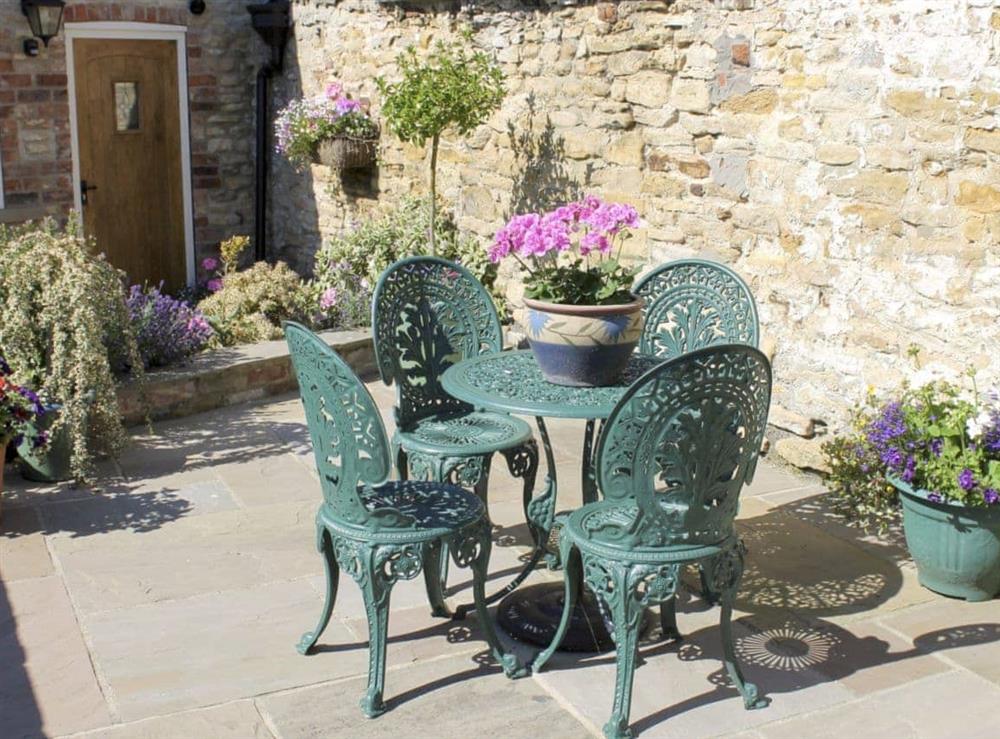 Outside dining area at Pond View Cottage in Brantingham, near Brough, North Humberside