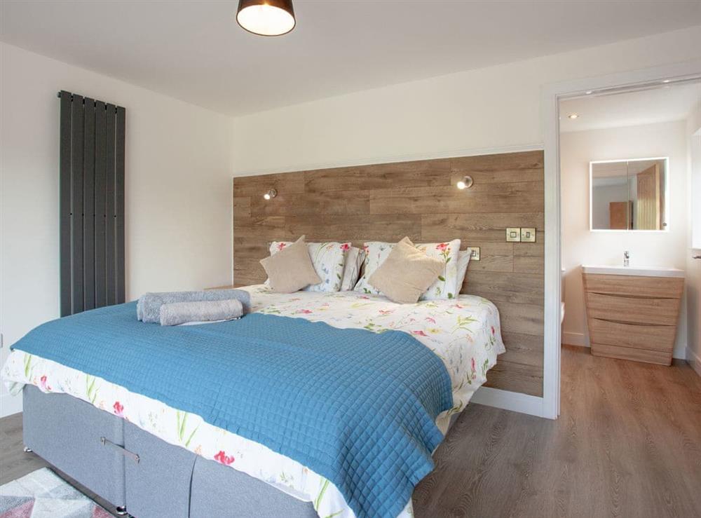 Master bedroom (photo 2) at Kingfisher Lodge, 