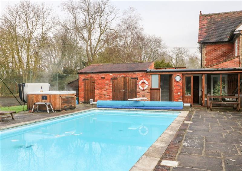 The swimming pool and hot tub at Pool Cottage, Broxholme near Saxilby, Lincolnshire
