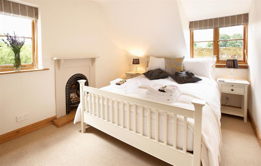 Double bedroom with 5’ bed at Pool Head Cottage, Westhide