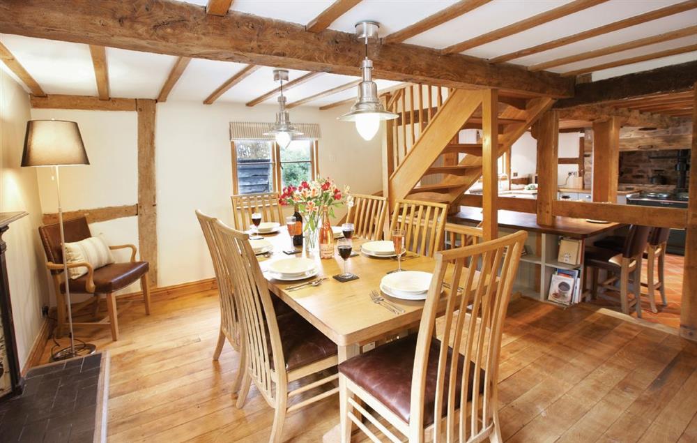 Open plan, fully fitted kitchen with dining area (photo 2) at Pool Head Cottage, Westhide
