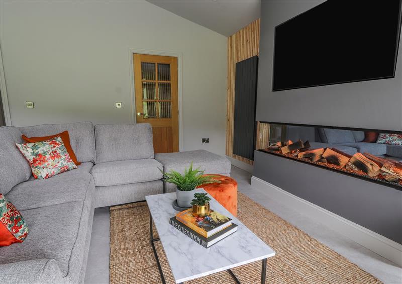 Relax in the living area at Pool View, Meifod