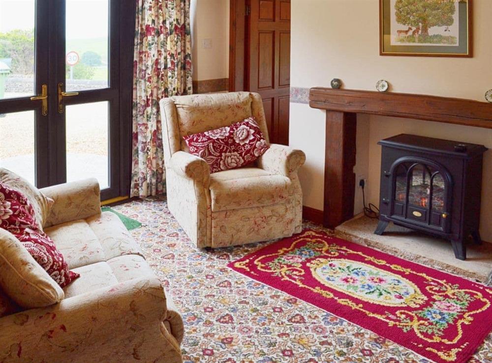 Living room/dining room at Poppies Court in Earl Sterndale, near Buxton, Derbyshire