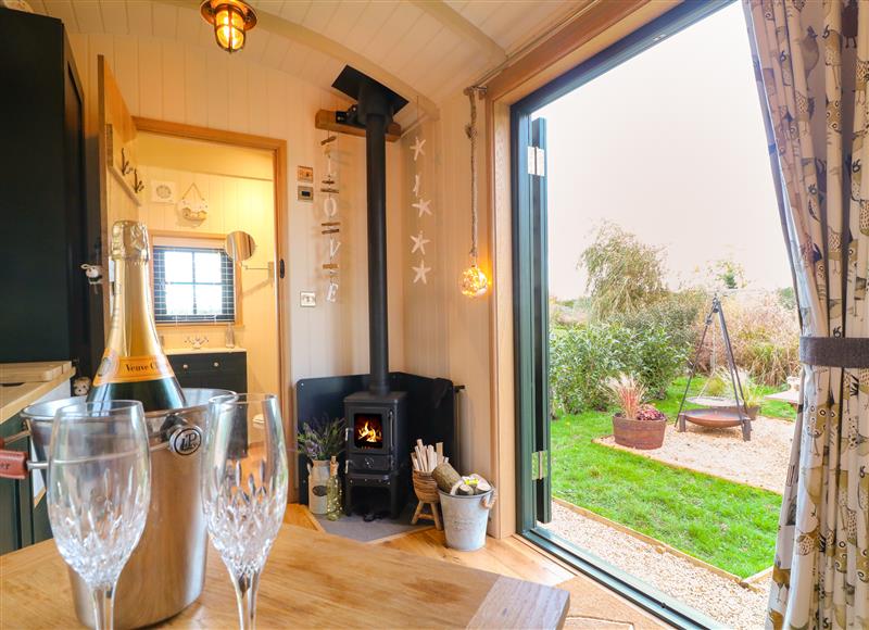 Relax in the living area at Poppies Shepherds Hut, Bottesford near Redmile and Vale of Belvoir