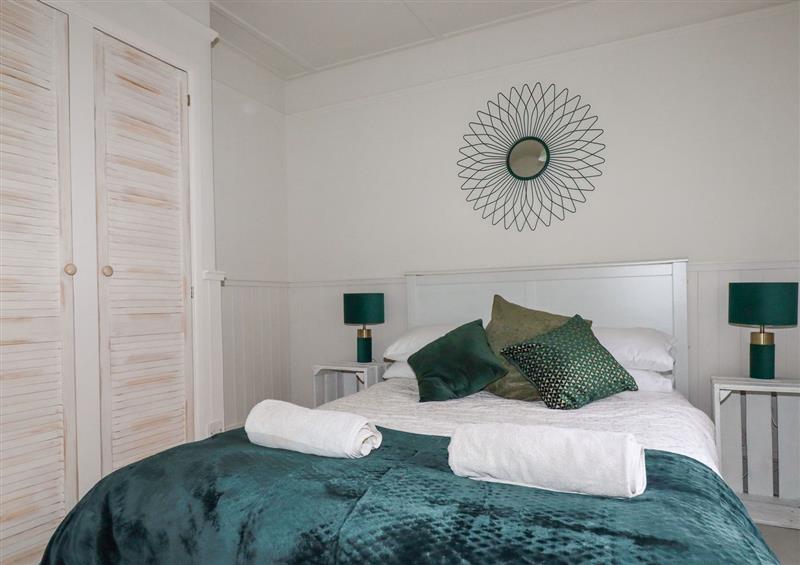 A bedroom in Poppins Cottage at Poppins Cottage, Looe