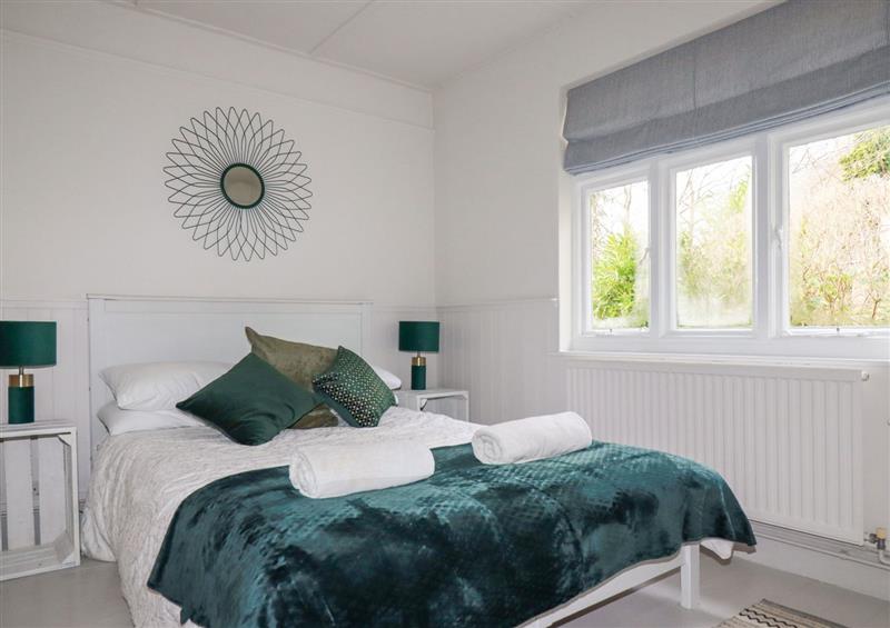 This is a bedroom at Poppins Cottage, Looe
