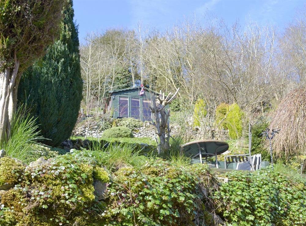 Good-sized terraced garden at Poppy Cottage in Bonsall, near Matlock, Derbyshire, England