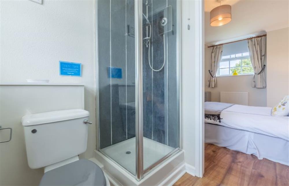 First floor: Master bedroom has en suite shower room (photo 3) at Poppy Cottage, Docking near Kings Lynn