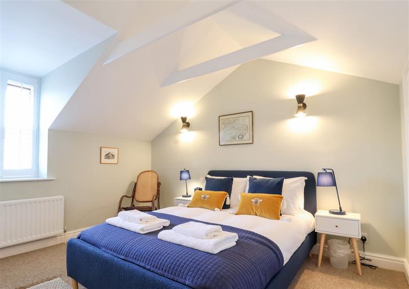 A bedroom in Poppy Cottage at Poppy Cottage, Southwold